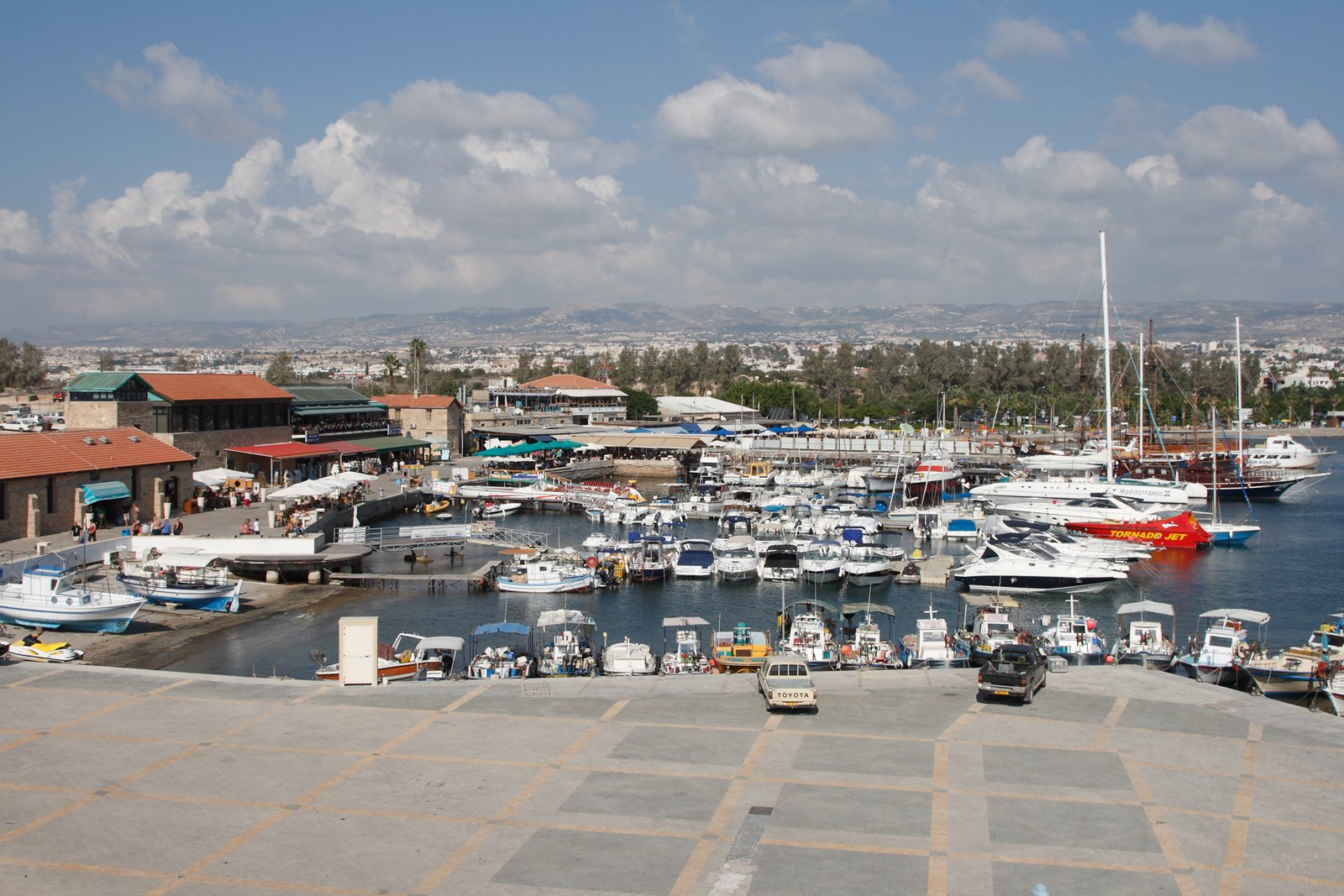 The harbour and coastline of Paphos, Cyprus, with the medieval Paphos Castle at the water's edge